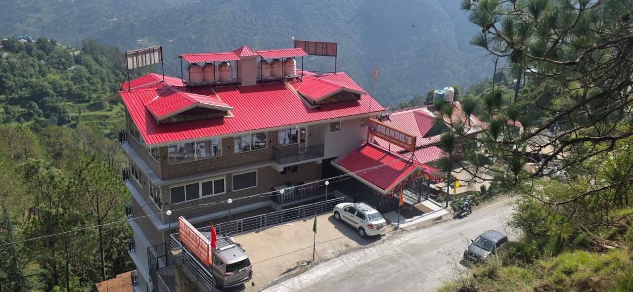 Shandil's Inn hillside property overlooking Shimla valley